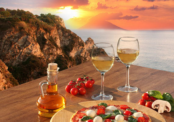 Sunset wine and pizza in Sicilia.